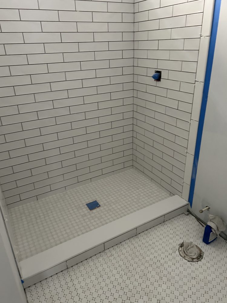 Subway tile shower surround finished in a St. Petersburg bathroom remodel