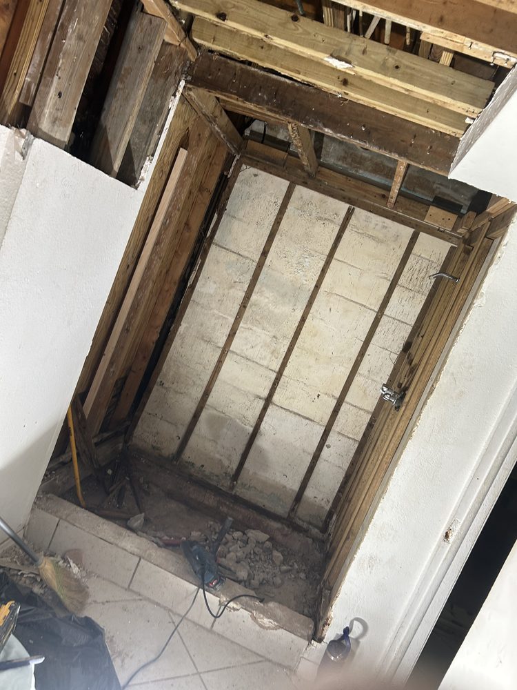 Replacing water-damaged framing behind a Florida shower wall